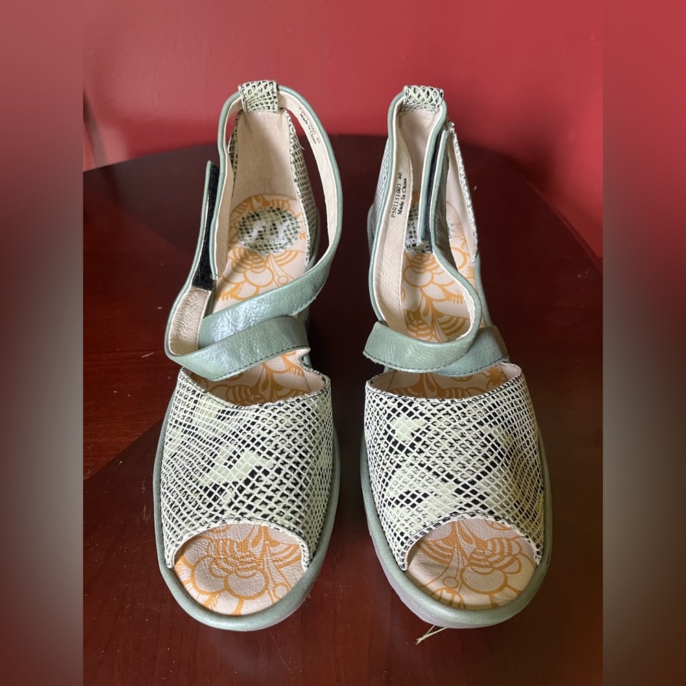 Fly London snake print sage sandal platform.